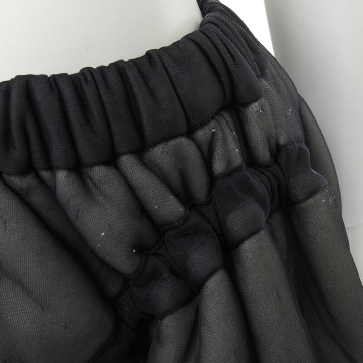 Female mannequin wearing Comme Des Garcons by Rei Kawakubo 1990 Black Nylon Women Skirt in Size  M | Available at JHROP