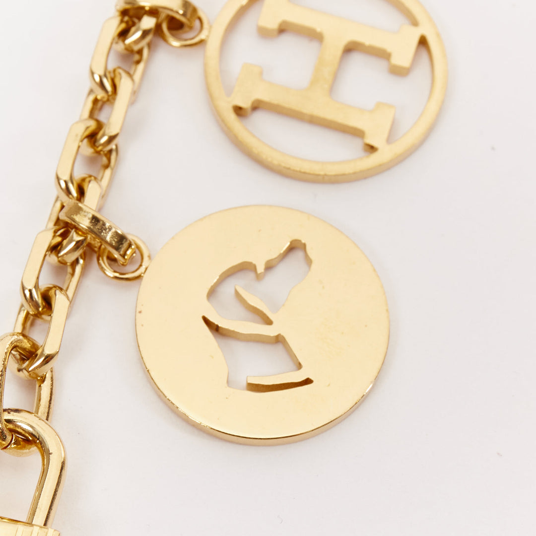 HERMES Palladium Gold Olga Cadena lock H logo horse dog coin bag charm chain