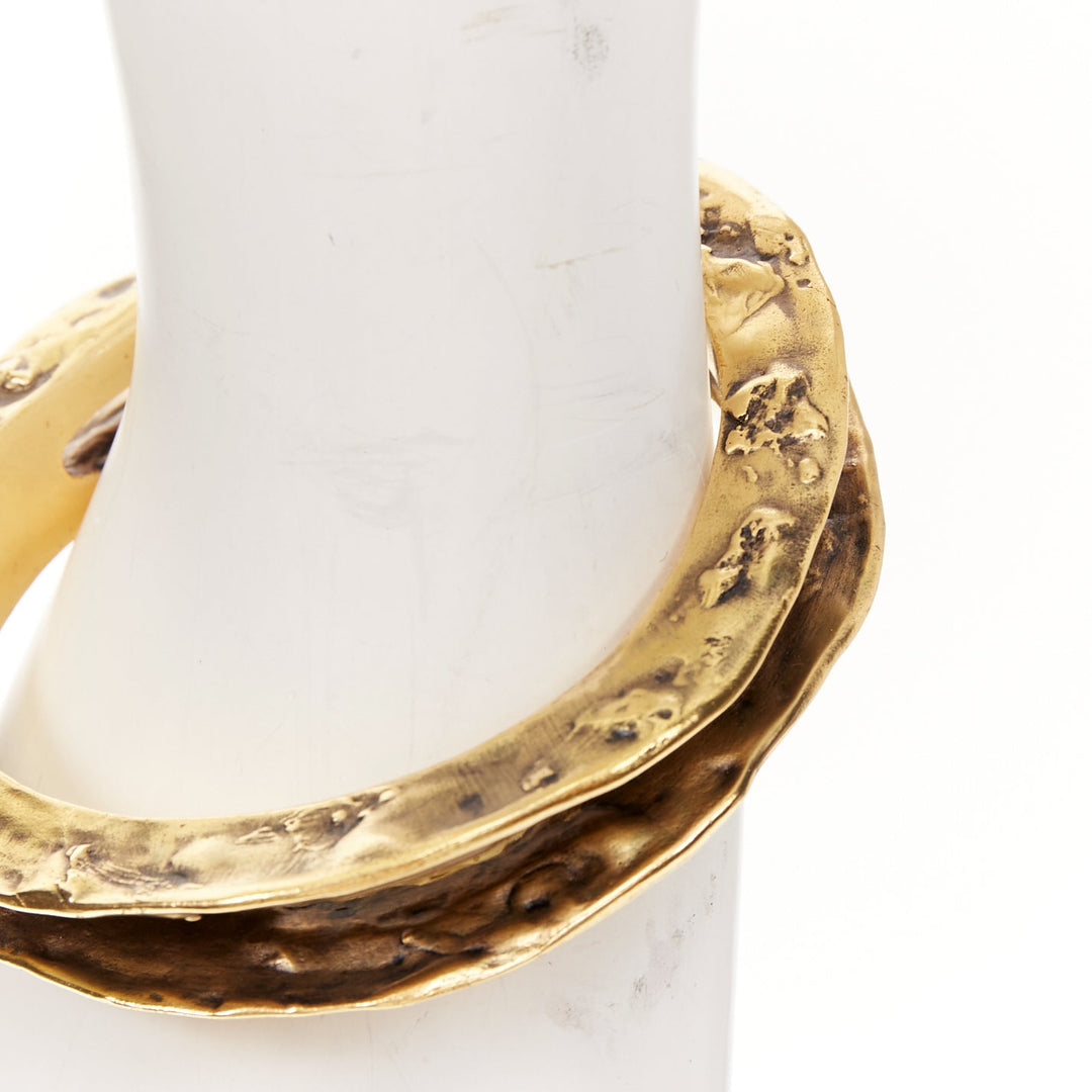 SAINT LAURENT 2023 Tornato Crater antique gold tone hammered hollow cuff bangle