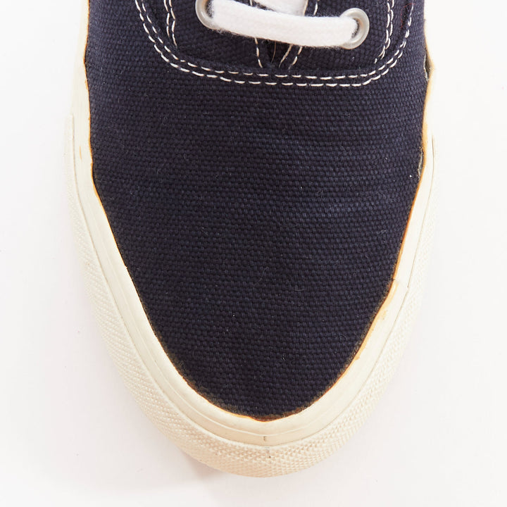 COMME DES GARCONS Homme navy canvas mid top skate sneakers EU39