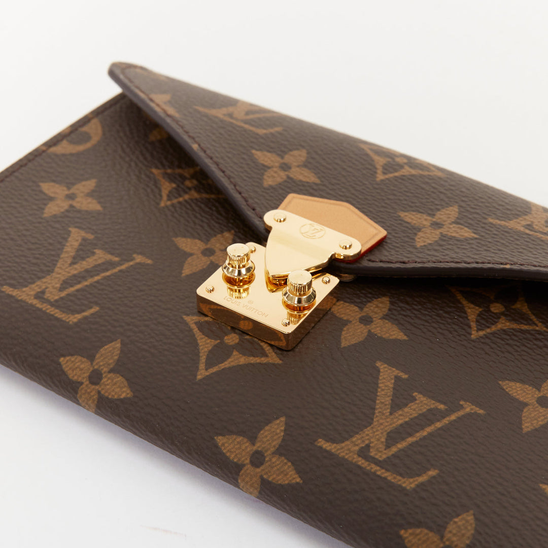 LOUIS VUITTON 2024 Metis brown monogram coated canvas S lock makeup pouch bag