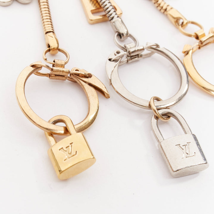 LOUIS VUITTON palladium gold plated pin LV lock heart flower keyring bag charm