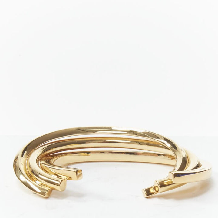 SAINT LAURENT gold tone architectural triple twist cuff bangle Hedi Slimane