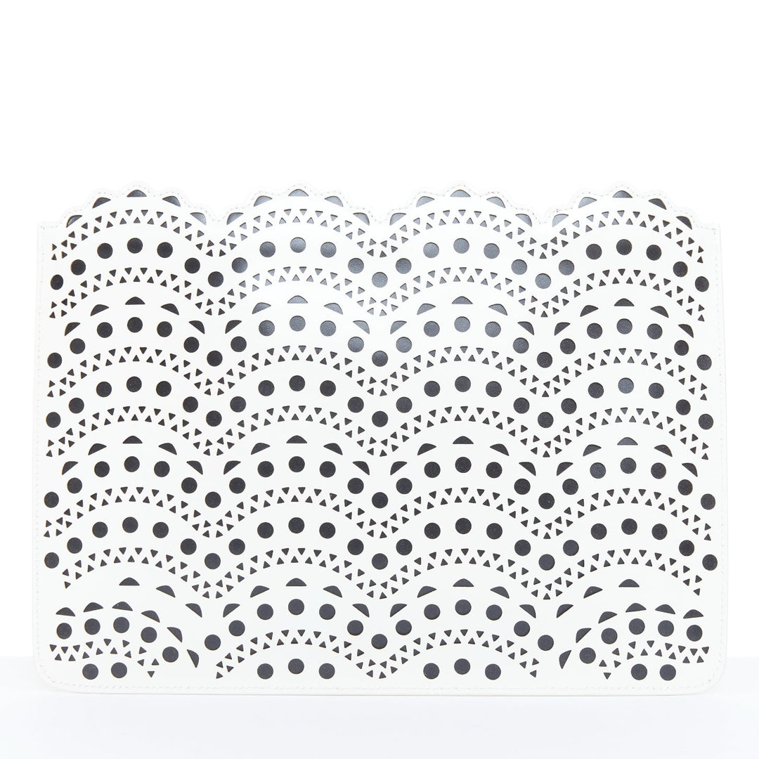 ALAIA Vienne laser cut white leather black lined scalloped zip pouch clutch bag