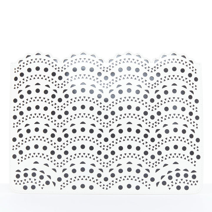 ALAIA Vienne laser cut white leather black lined scalloped zip pouch clutch bag