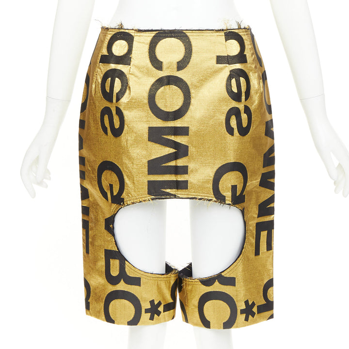 COMME DES GARCONS 2020 Runway gold black polyester silk logo cut out shorts M
