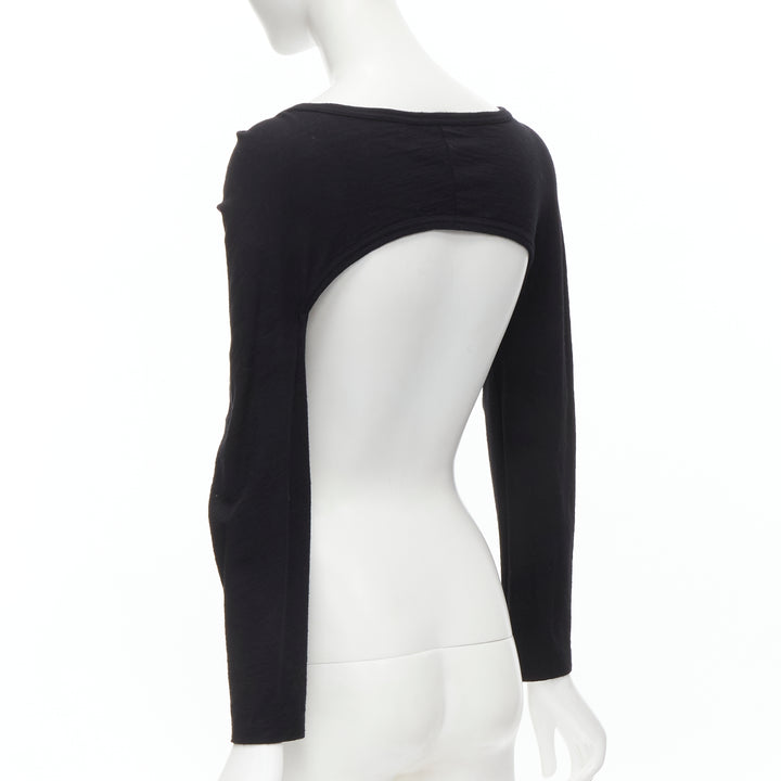 Female mannequin wearing Comme Des Garcons by Rei Kawakubo Black Women Top in Size  S | Available at JHROP