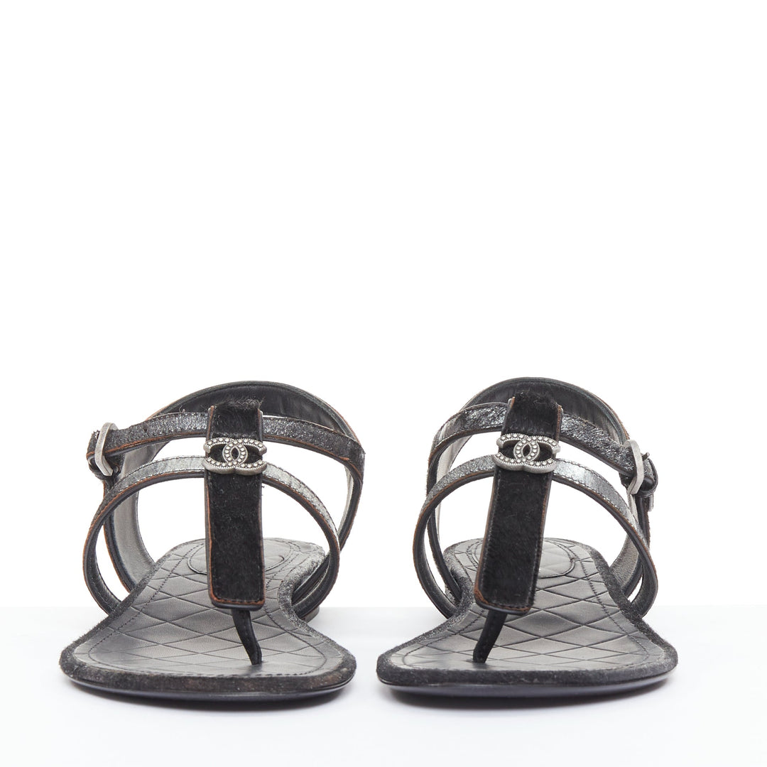CHANEL black pony hair metallic leather CC charm T-strap thong flat sandals EU36