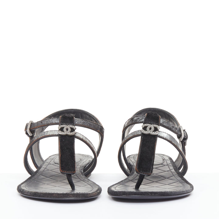 CHANEL black pony hair metallic leather CC charm T-strap thong flat sandals EU36