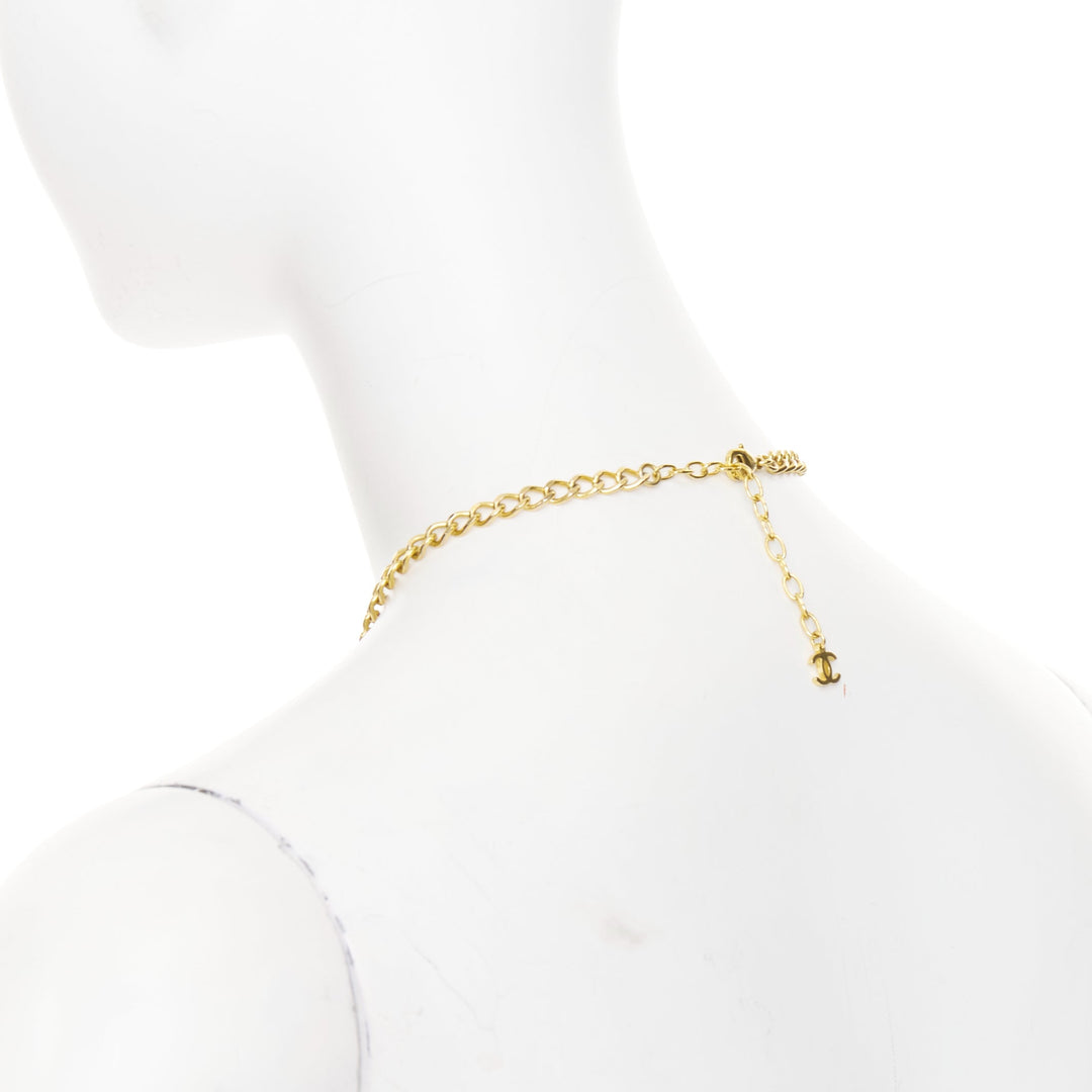 CHANEL 2023 Monte Carlo gold black glitter foil resin CC logo pendant  necklace