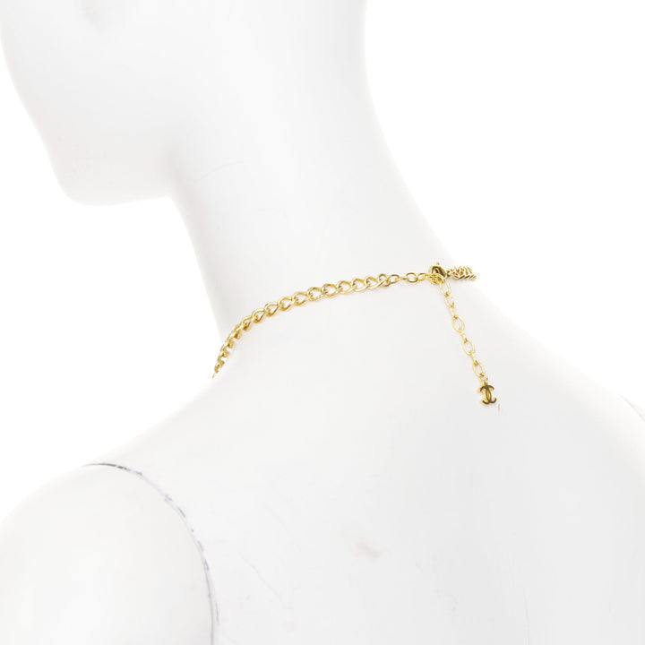 CHANEL 2023 Monte Carlo gold black glitter foil resin CC logo pendant  necklace