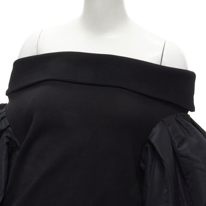 Female mannequin wearing Alexander McQueen by Sarah Burton Black Cotton Women Top in Size IT36 | Available at JHROP