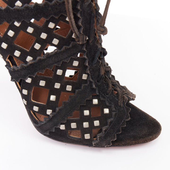 ALAIA black suede laser cut diamond lattice studded cage ankle booties EU35