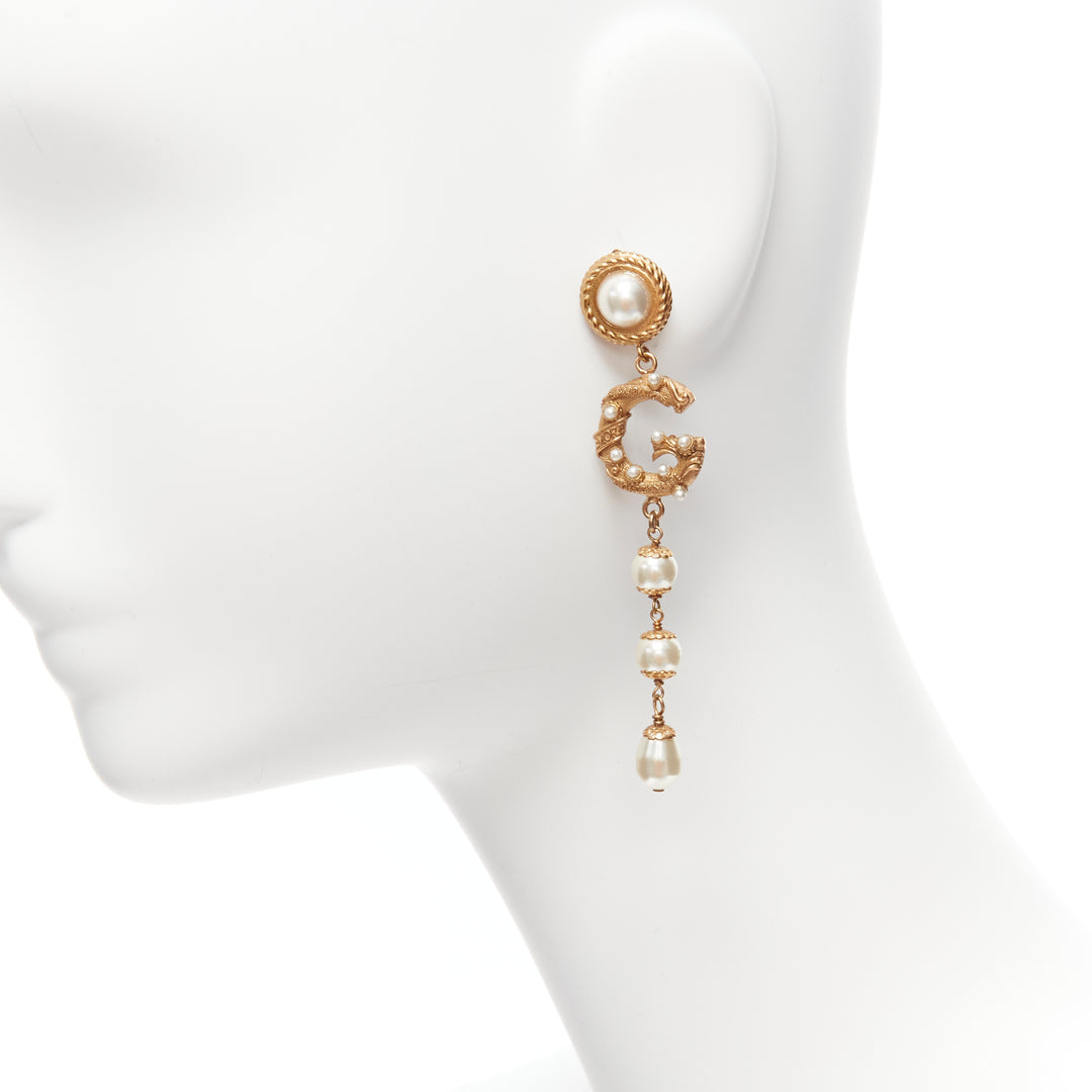 rare DOLCE GABBANA gold tone DG logo baroque pearl tiered drop clip earrings