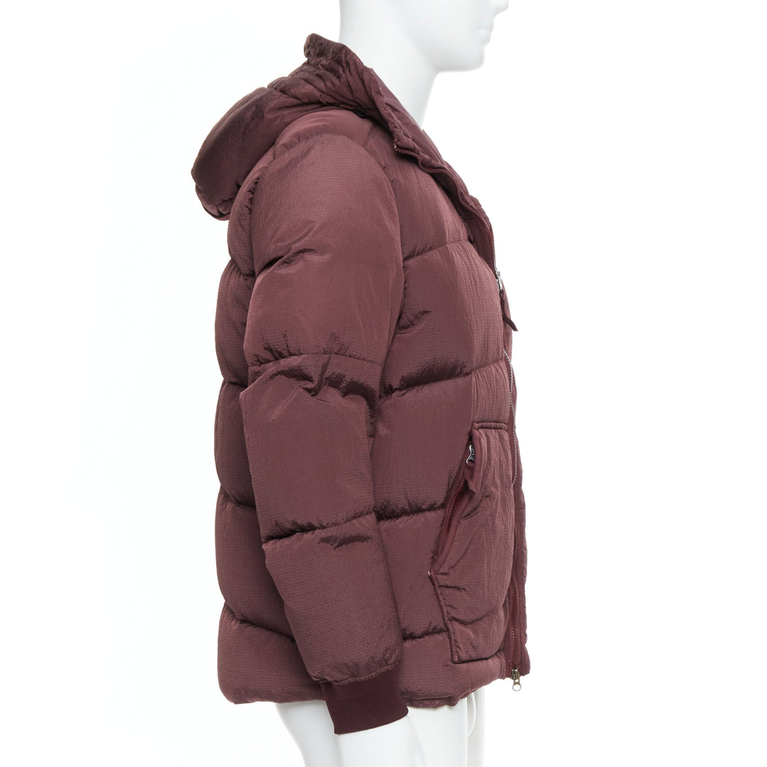 Male mannequin wearing Stone Island Purple Nylon Men Puffer Jacket in Size  M | Available at JHROP