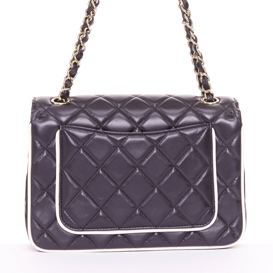 CHANEL 2025 Graphic Frame black quilted lambskin piping mini square flap bag