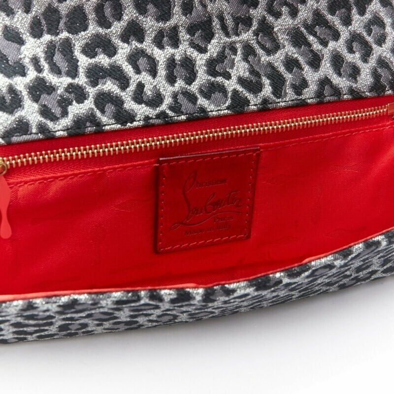 CHRISTIAN LOUBOUTIN Aionoeud silver leopard asymmetrical bow elongated clutch