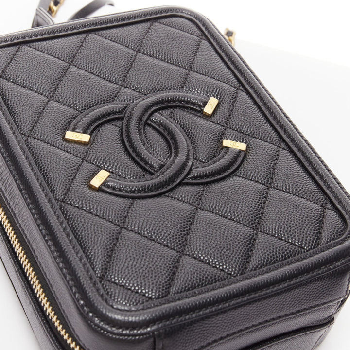 CHANEL N/S Vanity Vertical black filigree gold CC logo small crossbody bag