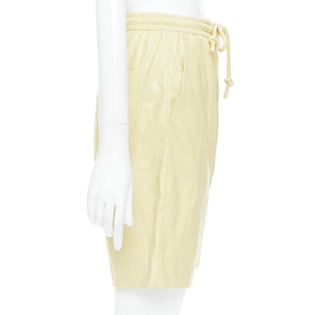 NANUSHKA  Munira Okobor butter yellow vegan leather drawstring bermuda shorts XS