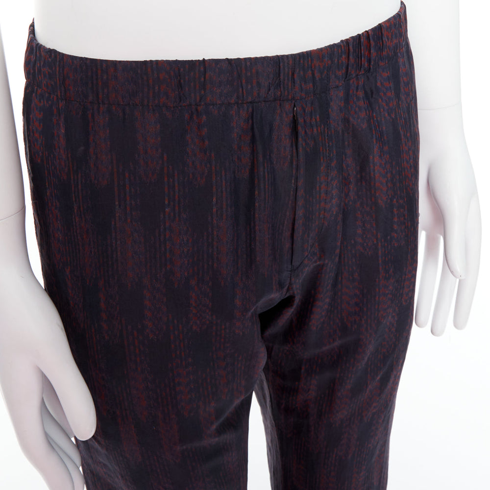 Male mannequin wearing Dries Van Noten Black Silk Men Pants in Size IT46 | Available at JHROP