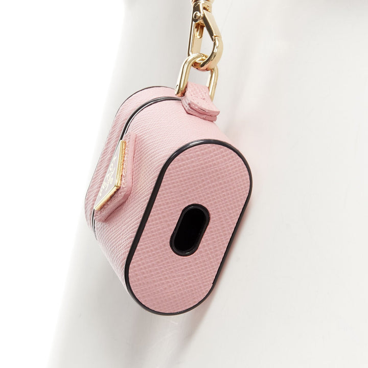  mannequin wearing Prada by Miuccia Prada AirPods case Pink Leather Key Chain in Size  | Available at JHROP