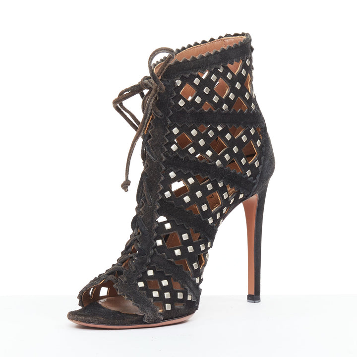 ALAIA black suede laser cut diamond lattice studded cage ankle booties EU35