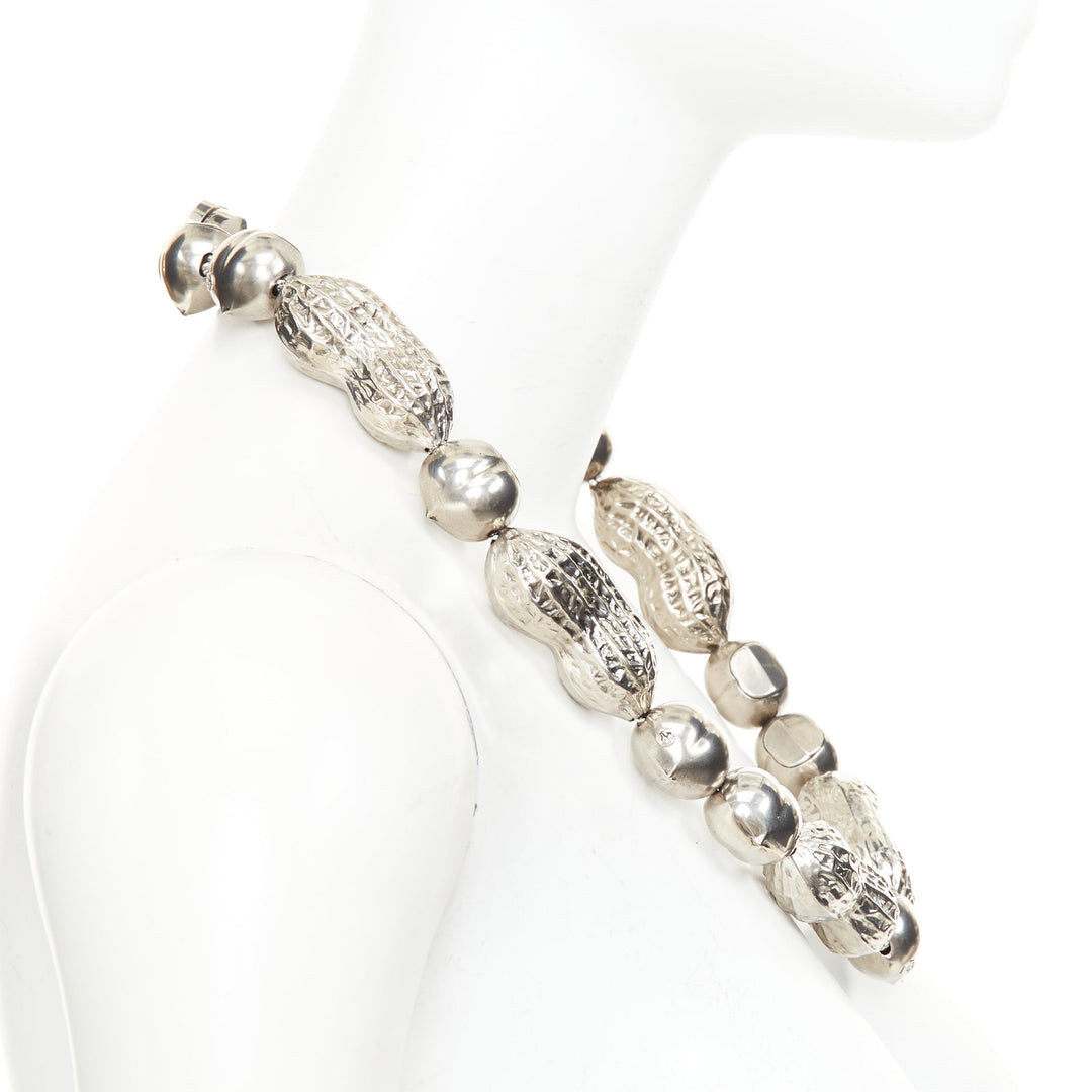 GUCCI Runway hazelnut peanut charm textured interlocking GG silver tone necklace