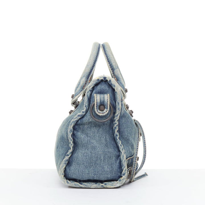 BALENCIAGA Le City Small blue washed denim gunmetal studded top handle bag