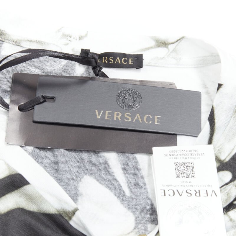 Female mannequin wearing Versace by Donatella Versace Spring Summer 2021 White Cotton Women T-Shirt in Size IT44 | Available at JHROP