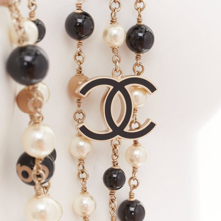 CHANEL B14C Coco Mademoiselle Figure black beige pearl triple sautoir necklace