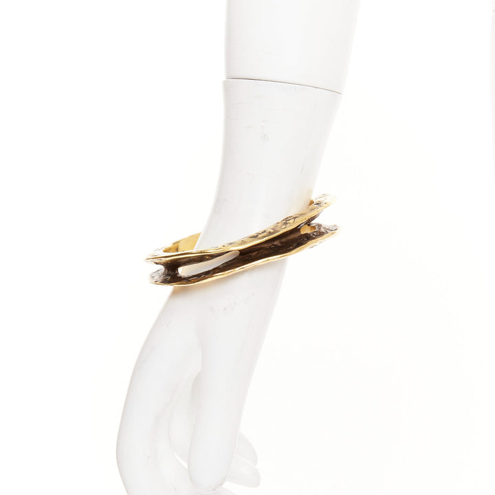 SAINT LAURENT 2023 Tornato Crater antique gold tone hammered hollow cuff bangle