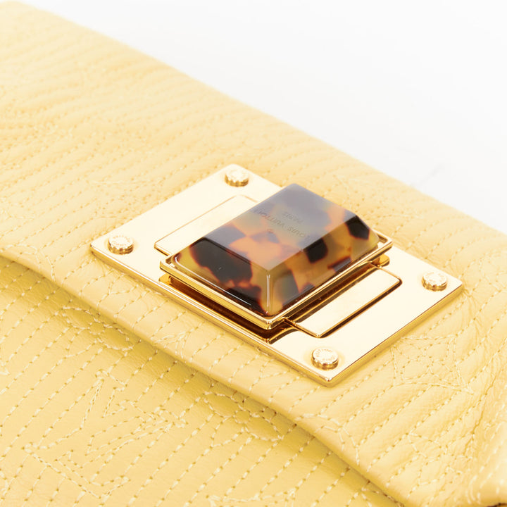 LOUIS VUITTON 2011 jaune Monogram Cuir Pochette Altair quilted leather clutch