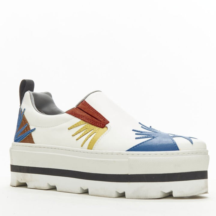 Female mannequin wearing MSGM White Leather Women Sneakers in Size EU36 | Available at JHROP