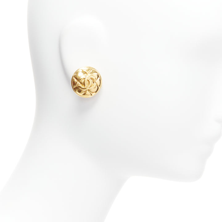 Female mannequin wearing Chanel by Karl Lagerfeld Gold Metal Women Jewelry Earring in Size  | Available at JHROP