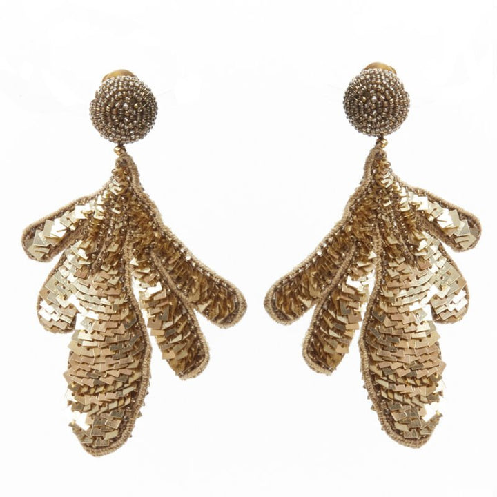 Female mannequin wearing Oscar de la Renta sequin leaf earring Gold Fabric Women Jewelry Earring in Size  | Available at JHROP