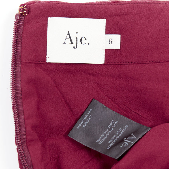 AJE Laurier Wave burgundy plisse organza high waist mini skirt UK6 XS