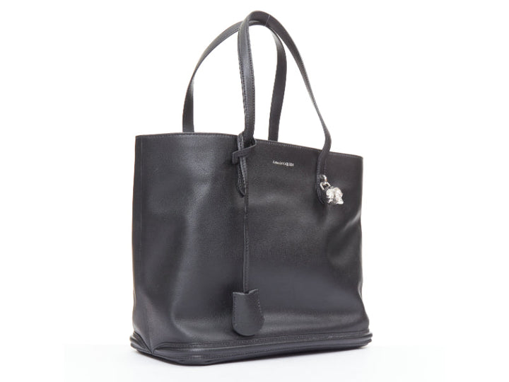ALEXANDER MCQUEEN black calfskin leather silver skull lock tote bag