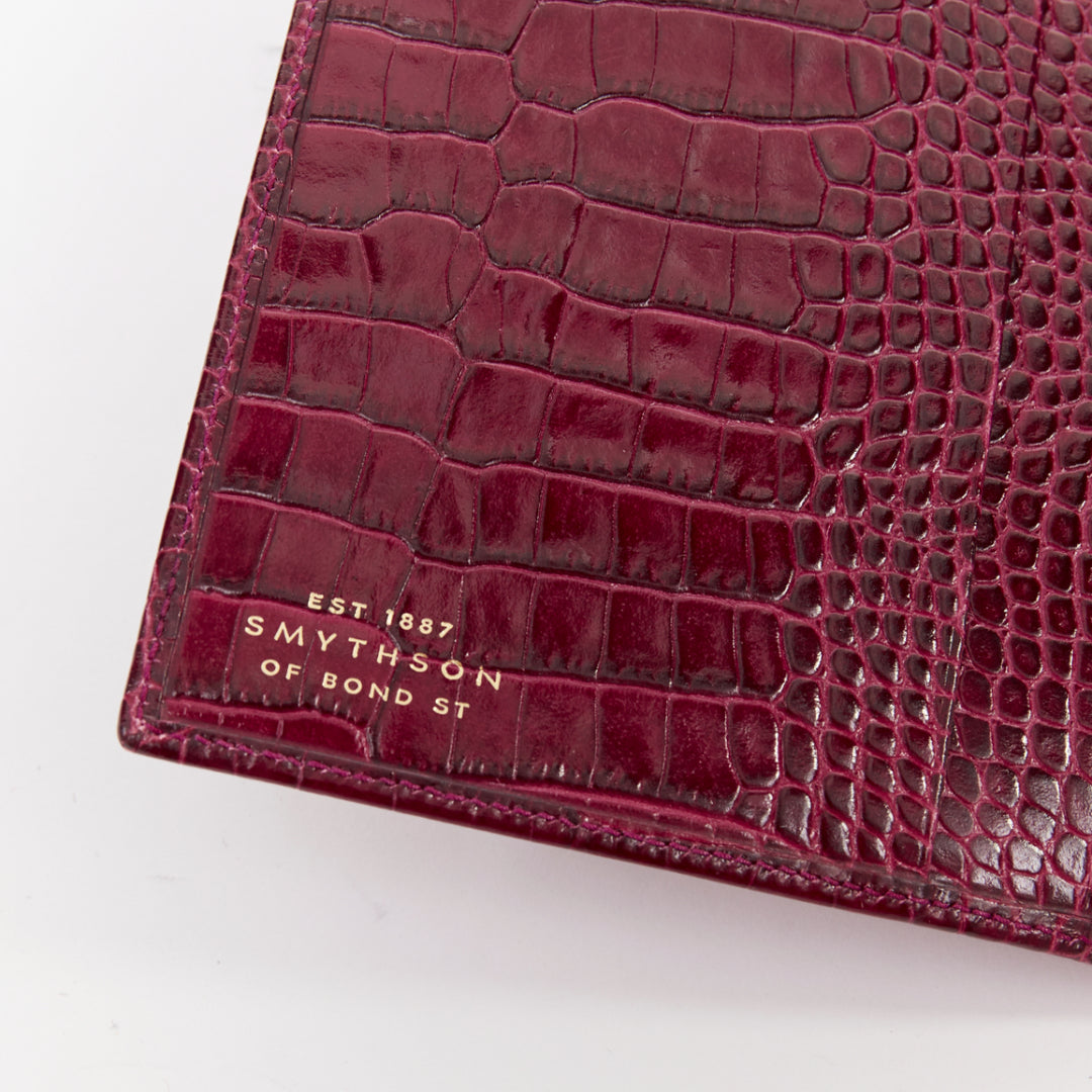 SMYTHSON Mara burgundy croc embossed high gloss teal clasp passport cover