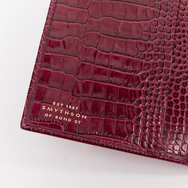 SMYTHSON Mara burgundy croc embossed high gloss teal clasp passport cover