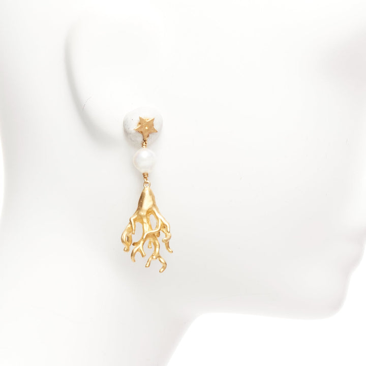 Female mannequin wearing Dior by Maria Grazia Chiuri Tribales Gold Metal Women Jewelry Earring in Size  | Available at JHROP