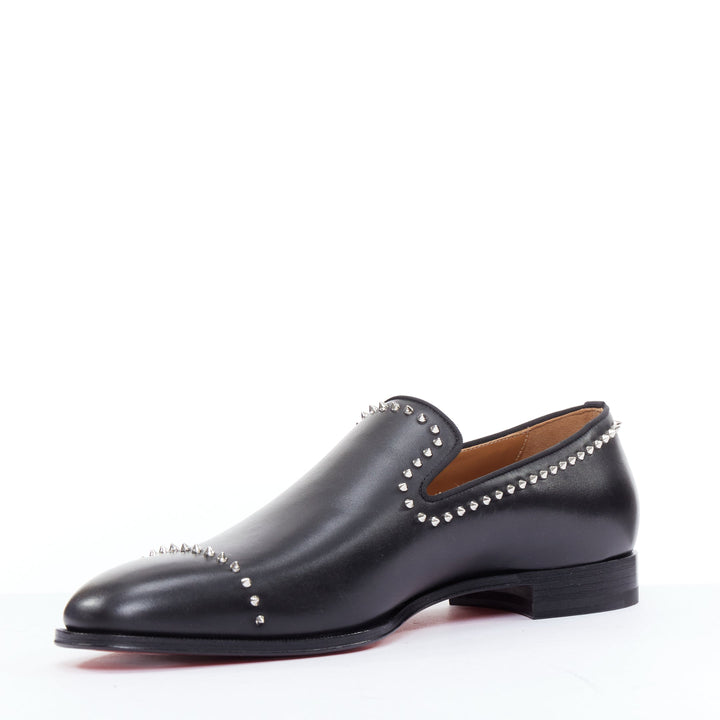 Male mannequin wearing Christian Louboutin Dandy Cloo Black Leather Men Loafer in Size EU43 | Available at JHROP