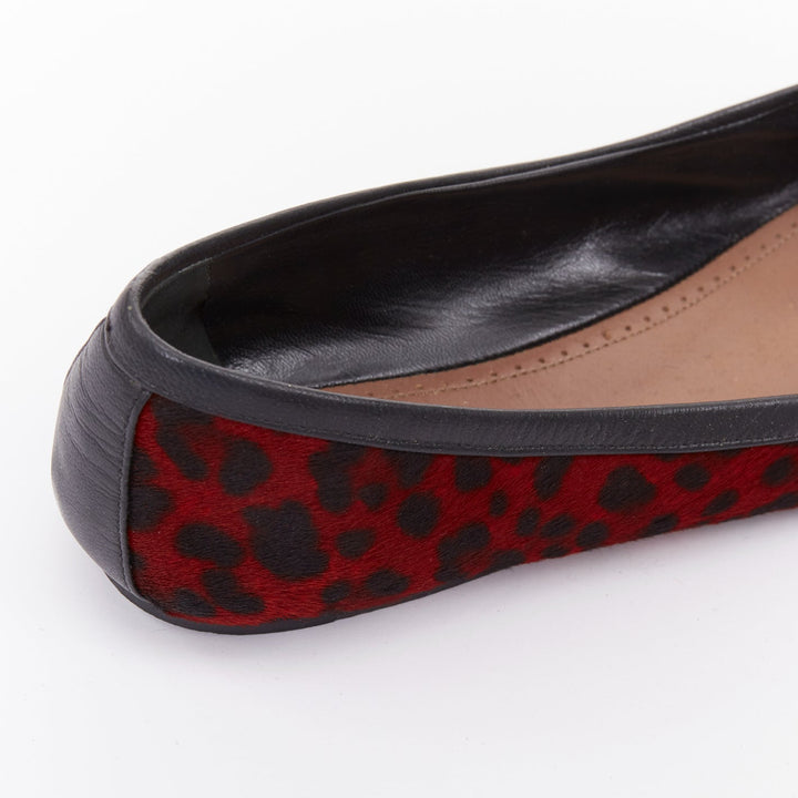 ALAIA red calf hair leopard print black leather trim ballet flats EU37.5