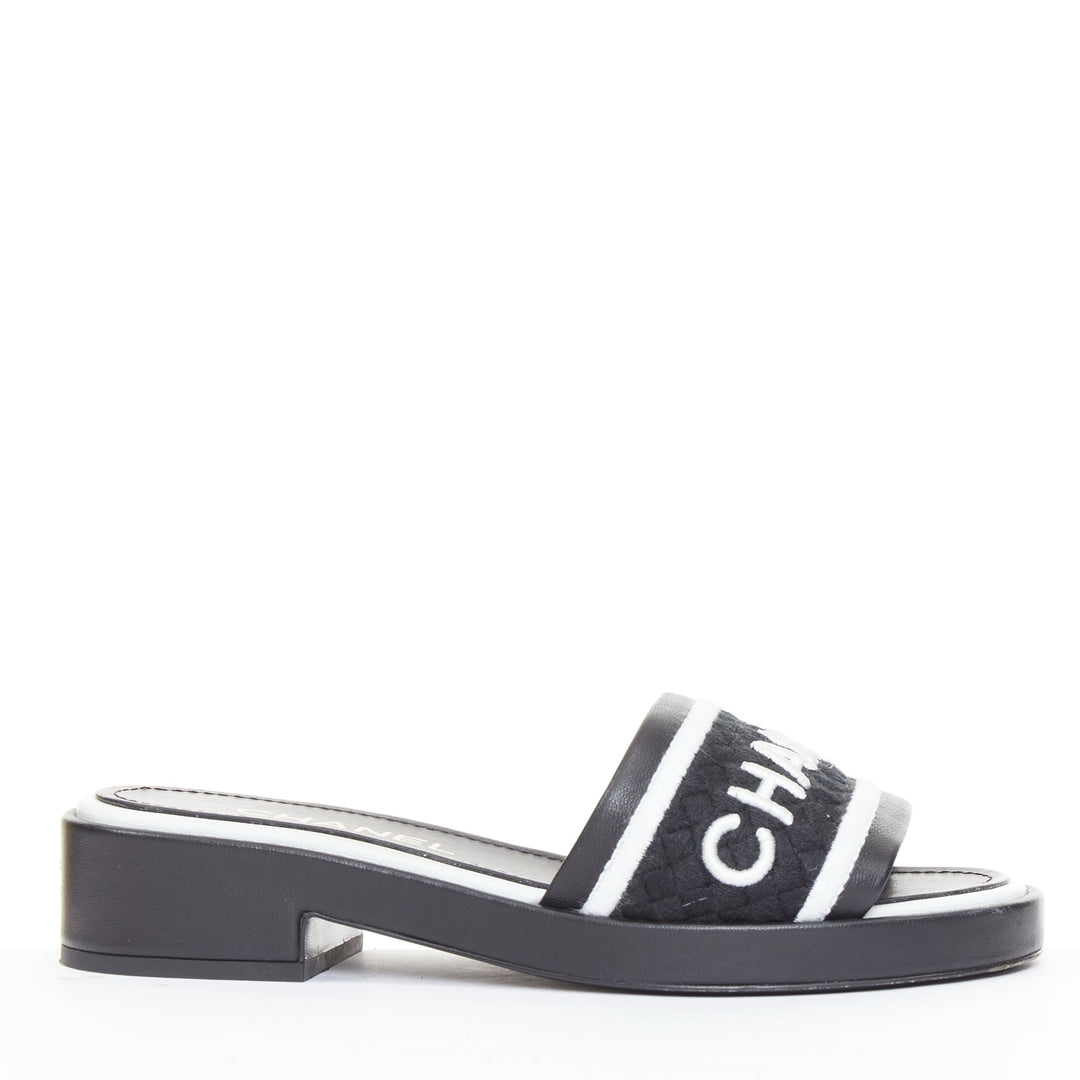 CHANEL 2021 Runway black white logo embroidered lambskin CC mule sandals EU35.5