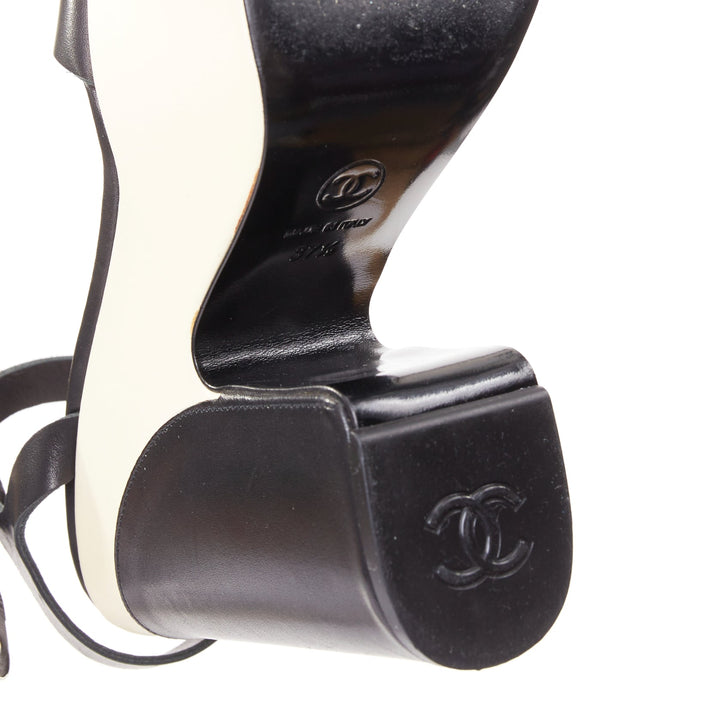 CHANEL 2012 black cream bicolor calfskin silver CC wedge platform heels EU37.5