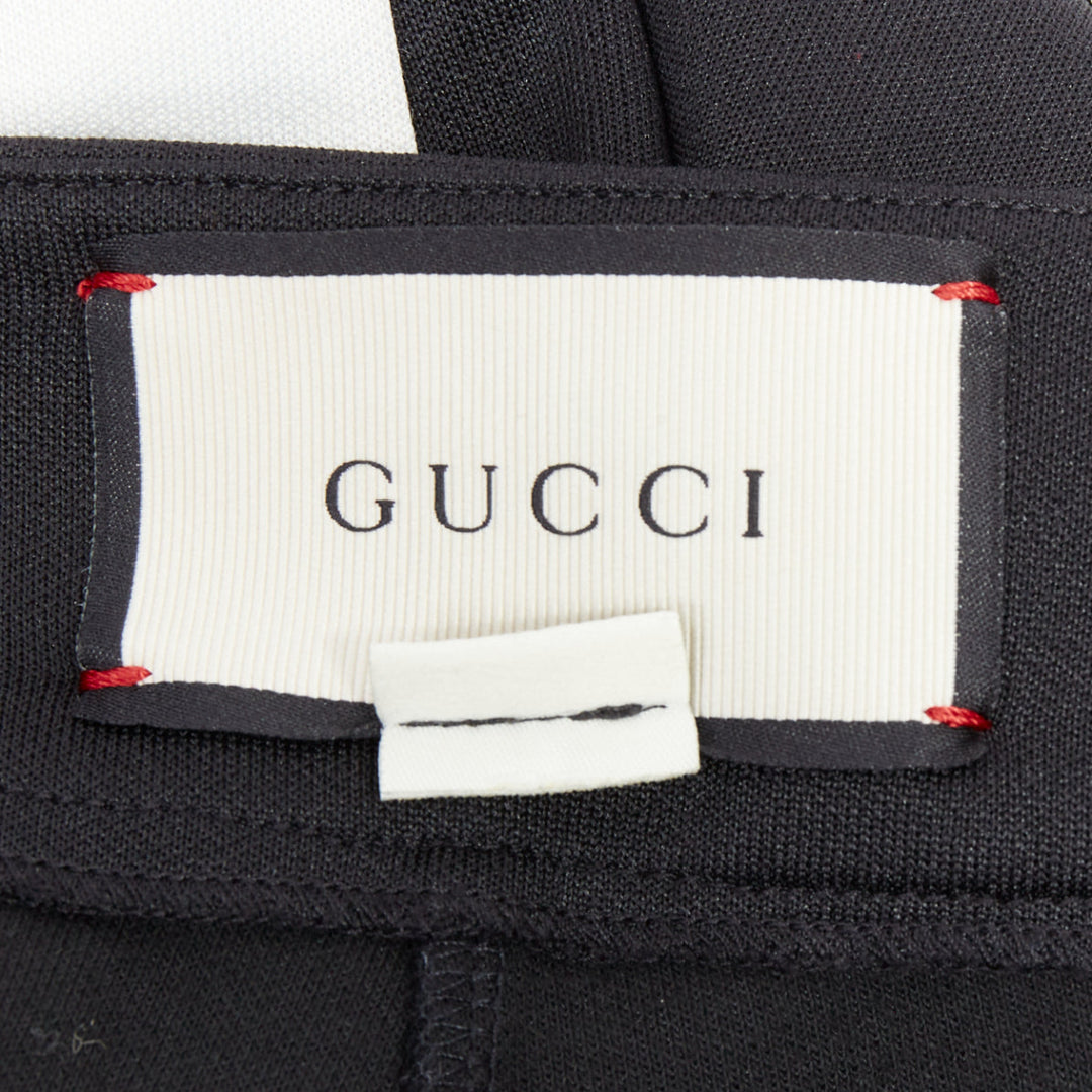 GUCCI LOVED red embroidered black piped flare track pants