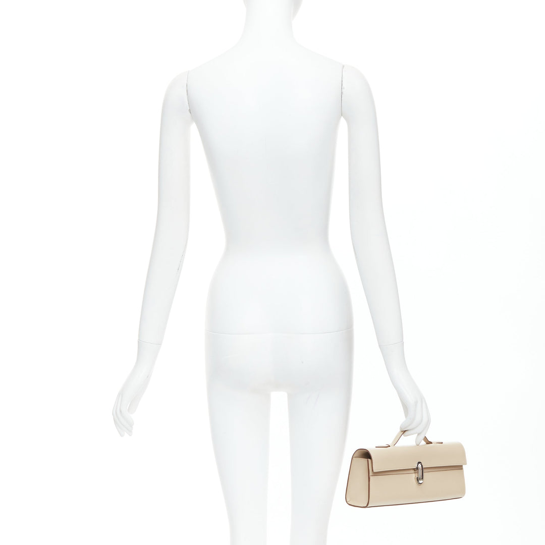 SAVETTE Symmetry beige silver buckle elongated pochette top handle bag