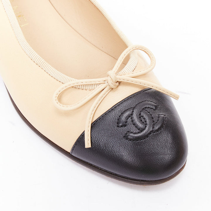 CHANEL cream black leather CC logo two tone monochrome toe cap flats EU37