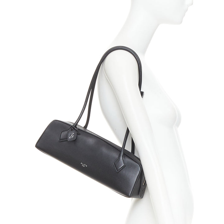 ALAIA Le Teckel black leather elongated long handle double zip bag