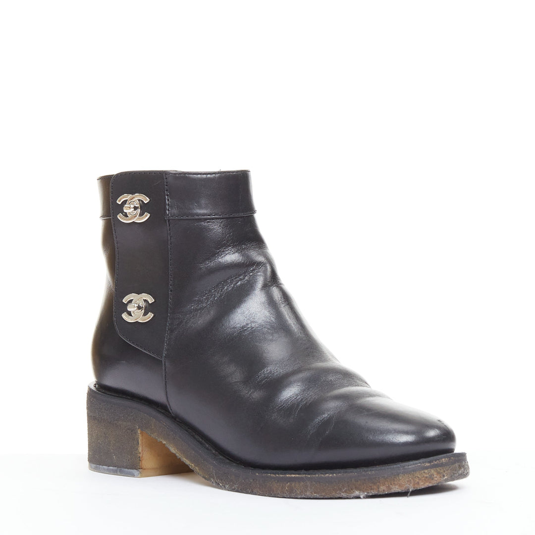 CHANEL Turnlock CC black leather silver logo crepe rubber sole ankle boots EU37