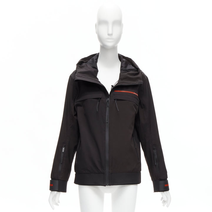 Female mannequin wearing Prada by Miuccia Prada 2021 Linea Rossa Black Nylon Women Parka Jacket in Size  M | Available at JHROP